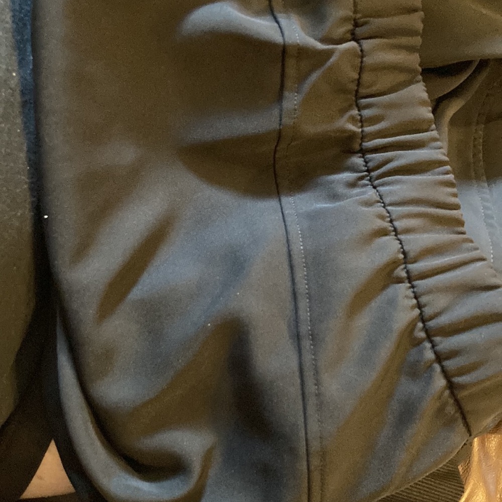 Never worn black polyester material